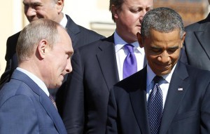 Vladimir Putin and Barack Obama talking during G20 summit in St.Petersburg, September 5, 2013. Photo: REUTERS/Kevin Lamarque.