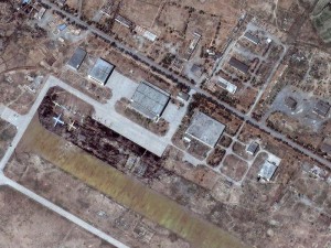 Satellite photo of the US air base Bagram in Afghanistan. A large number of transport aircrafts being loaded by unidentified cargo are clearly seen.