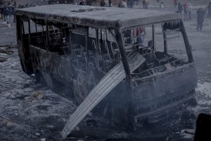 Ukraine's "peaceful pro-European" protesters leave a burnt land behind. Photo of a burnt police bus taken by S.Morgunov at the Euromaidan on January 20, 2014