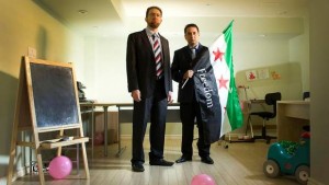 Louay Sakka (R) is an executive member of the US-based Syrian Support Group. He often works out of an office space in his basement in Oakville, ON. His childhood friend, Anas Al-Kassem (L), is a fellow Syrian activist.