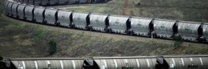 Mongolian train full of coal, heading to China. Mongolian mining sector (and by degrees, its entire economy) is dependent on Chinese coal consumption.