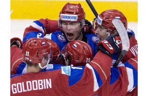 Russian U20 ice hockey team celebrates victory over Sweden in semifinal at the IIHF World Junior Championship in Toronto on Jan. 4, 2015. THE CANADIAN PRESS/Nathan Denette