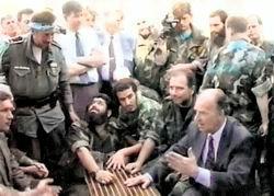 Bosnian Muslim President Alija Izetbegovic, lower right, meeting with Al-Qaeda linked Arab-Afghan mujahedeen in Bosnia.