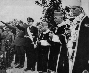 Croatian Ustashi fuehrer Ante Pavelic giving Nazi salute (far left) with Archbishop Alojzije Stepinac (far right) and other Roman Catholic Church priests