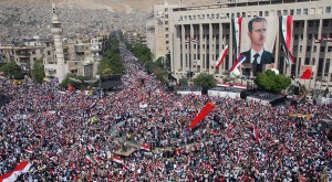 Syrians rally in Damascus in support of President Bashar al-Assad, October 2011