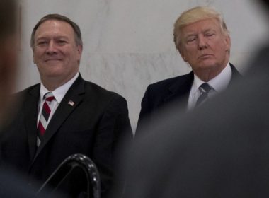 President Donald Trump, accompanied by CIA Director-designate Rep. Michael Pompeo, left, waits to speak at the Central Intelligence Agency in Langley, Va., Saturday, Jan. 21, 2017. (AP Photo/Andrew Harnik)