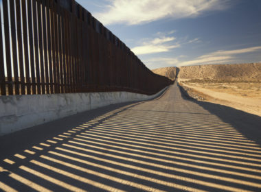Fence separating United States and Mexico