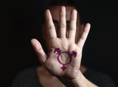 transgender symbol in the palm of the hand