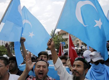 Demonstrators shout slogans as they attend a protest in front of the Thai Embassy in Ankara