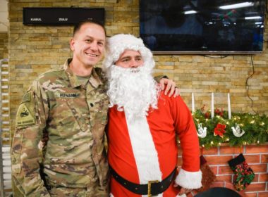 A soldier with a Santa