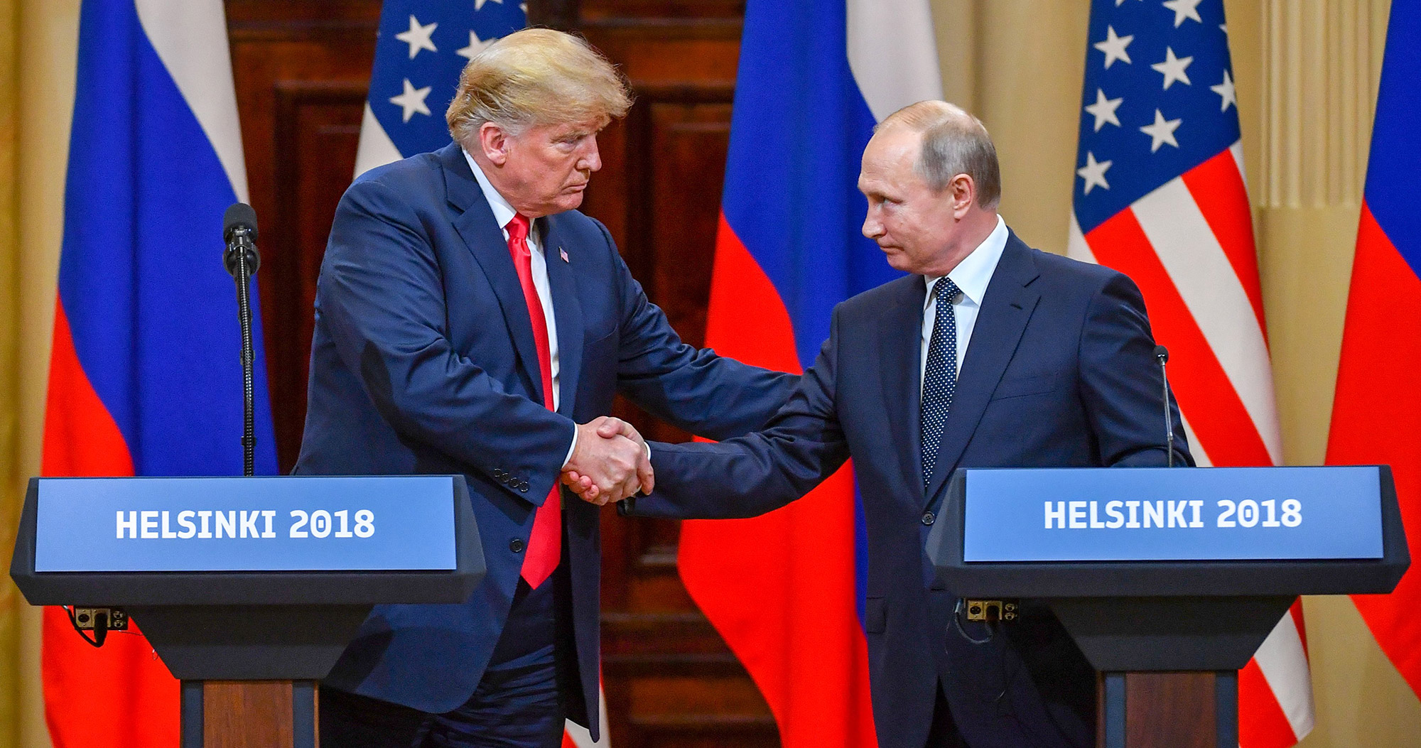 Trump and Putin shaking hands in Helsinki