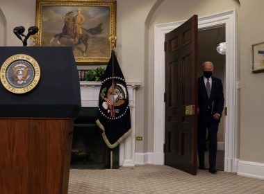 Biden behind the door