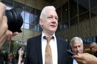 Assange-walks-free-after-guilty-plea