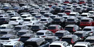 New cars of various brands are prepared for export on the parking lot of a car terminal at the harbour of Duisburg.