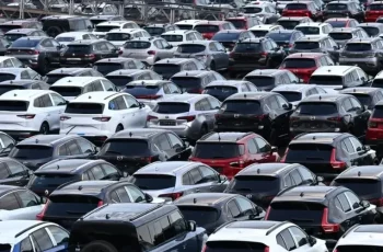 New cars of various brands are prepared for export on the parking lot of a car terminal at the harbour of Duisburg.